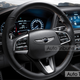 Illustration for article titled Genesis G80 Sport, The Blue Seated Carbon Fiber Trimmed Gold Stiched Steering Wheel Twin-Turbo Sedan All Three Of Us Have Been Waiting For...